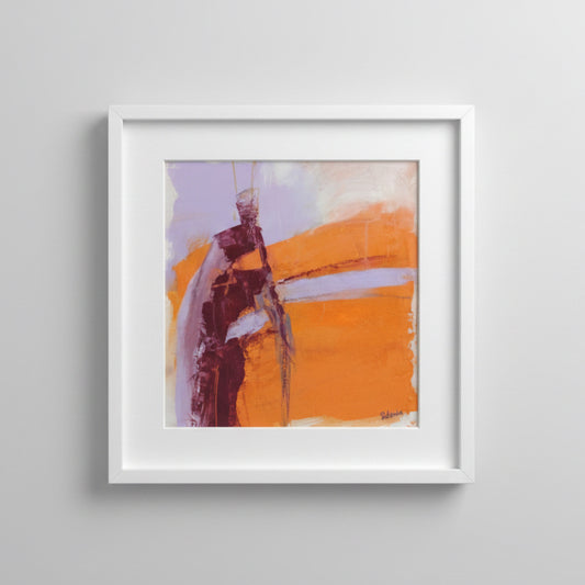 Framed abstract artwork with a white border on a white wall