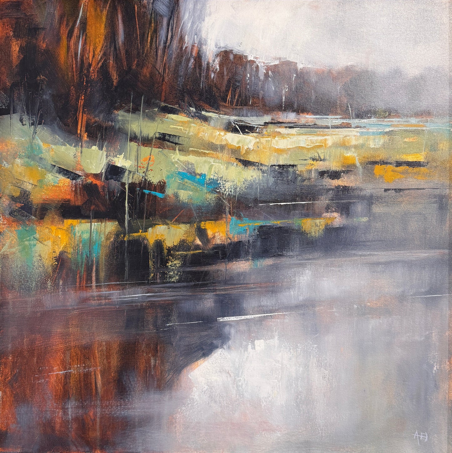 An abstract framed painting hanging on a textured beige wall. The artwork features vertical brushstrokes in gray, black, white, yellow, blue, and brown tones, enclosed in a dark frame.