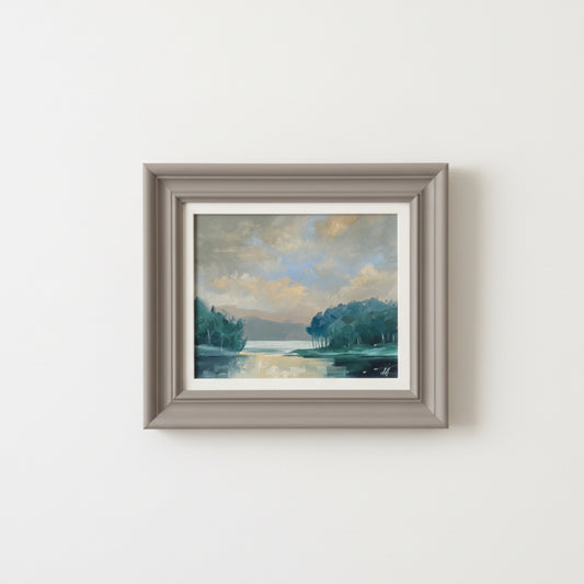 Framed painting on a white wall