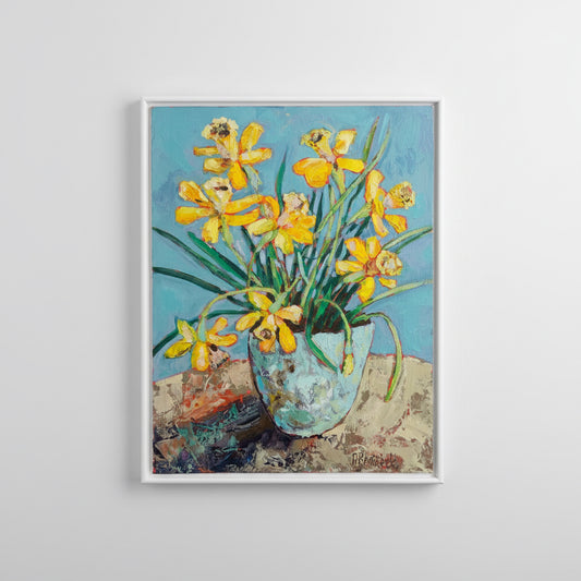 Framed artwork of yellow flowers on a textured background