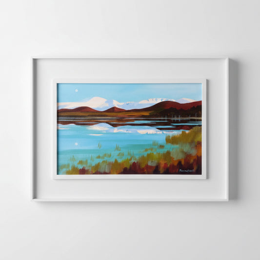 Framed landscape painting of the Cairngorms, showing snowy hills and a cool blue lake