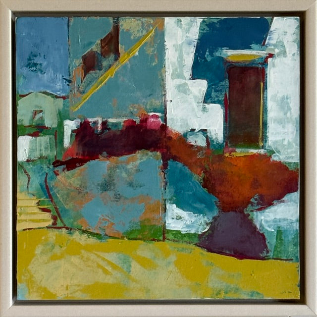 An abstract expressionist painting featuring bold blocks of teal, blue, yellow, rust orange, white, and deep red, housed in a light-colored square frame.