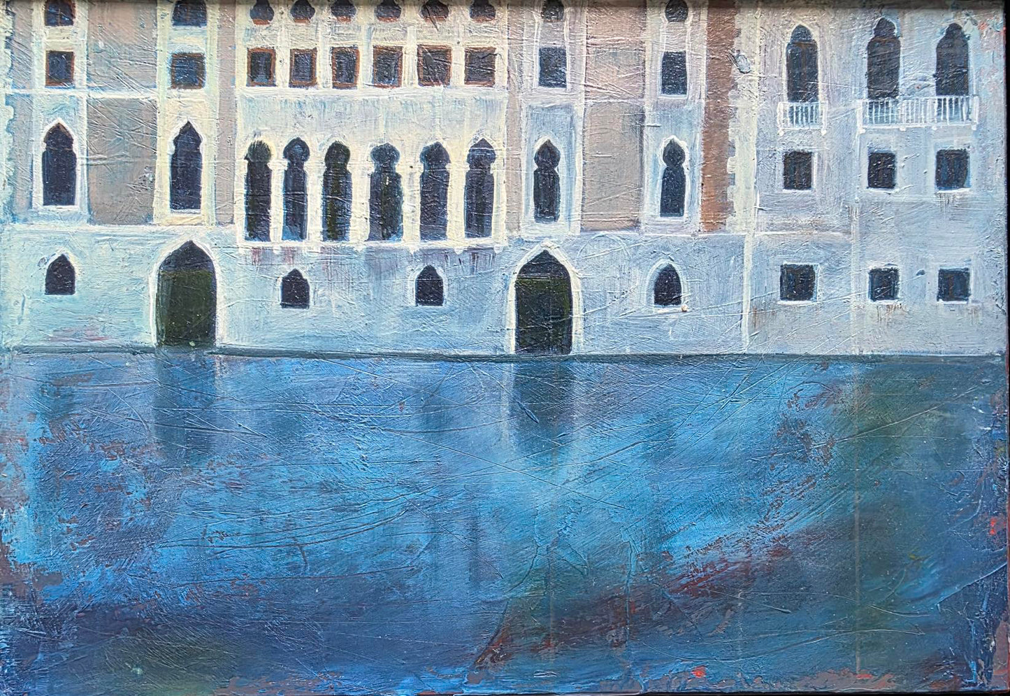 Framed artwork of a building reflected in water