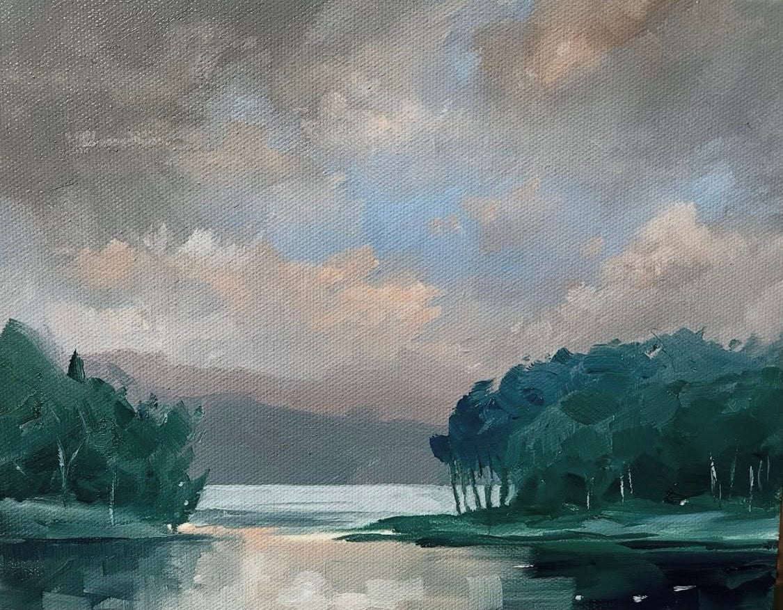 Painting of a water with trees and a cloudy sky with a patch of blue sky peeking through. the trees are a vibrant turquoise. Oil on Board painted by Alex Hinge and measuring 36x32cm framed.