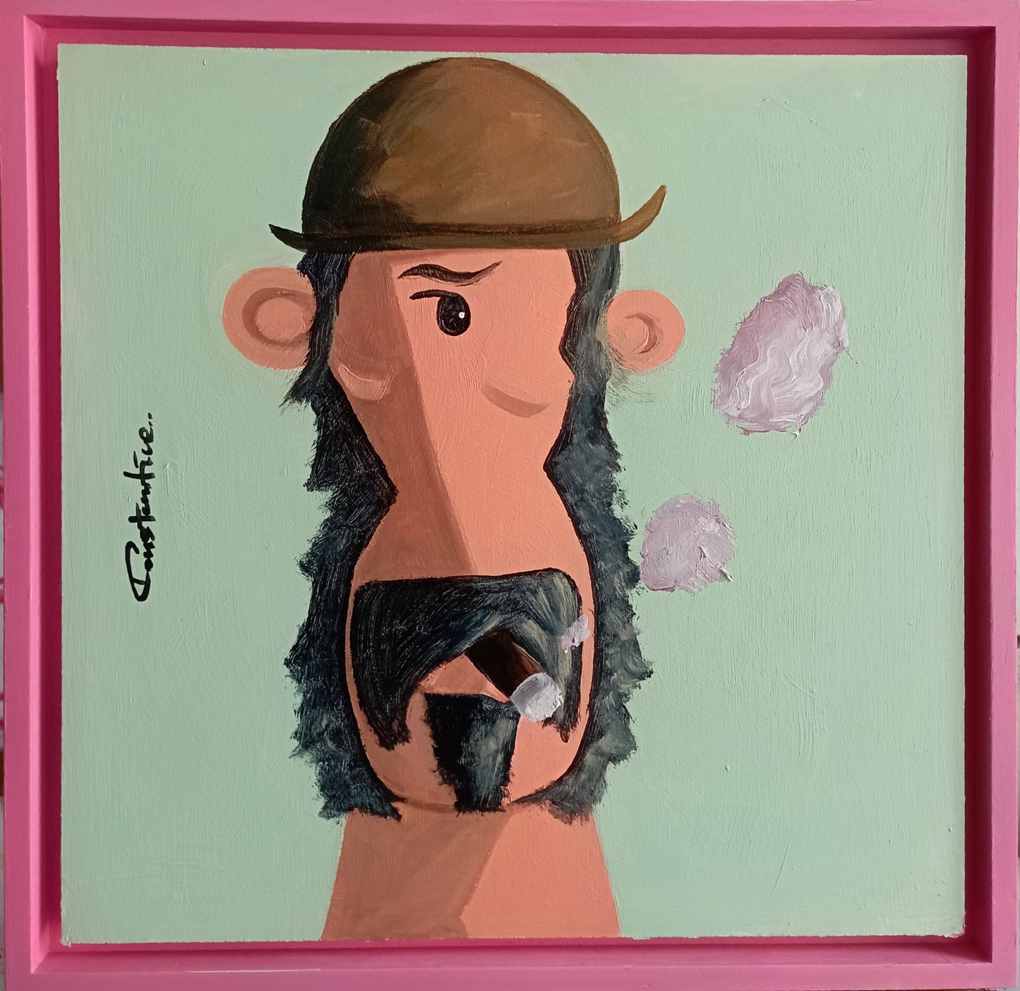 A framed surreal painting featuring a stylized figure with a brown hat, peach-toned face and neck, dark textured hair or beard, and pink abstract shapes on a pale mint background, enclosed in a bright pink frame.