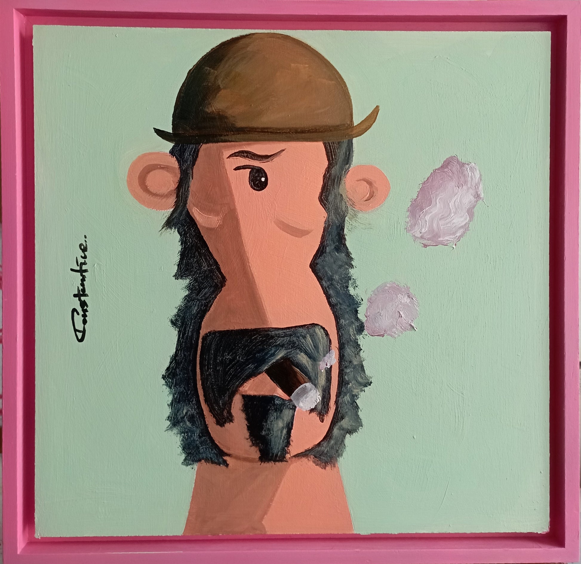 A framed surreal painting featuring a stylized figure with a brown hat, peach-toned face and neck, dark textured hair or beard, and pink abstract shapes on a pale mint background, enclosed in a bright pink frame.