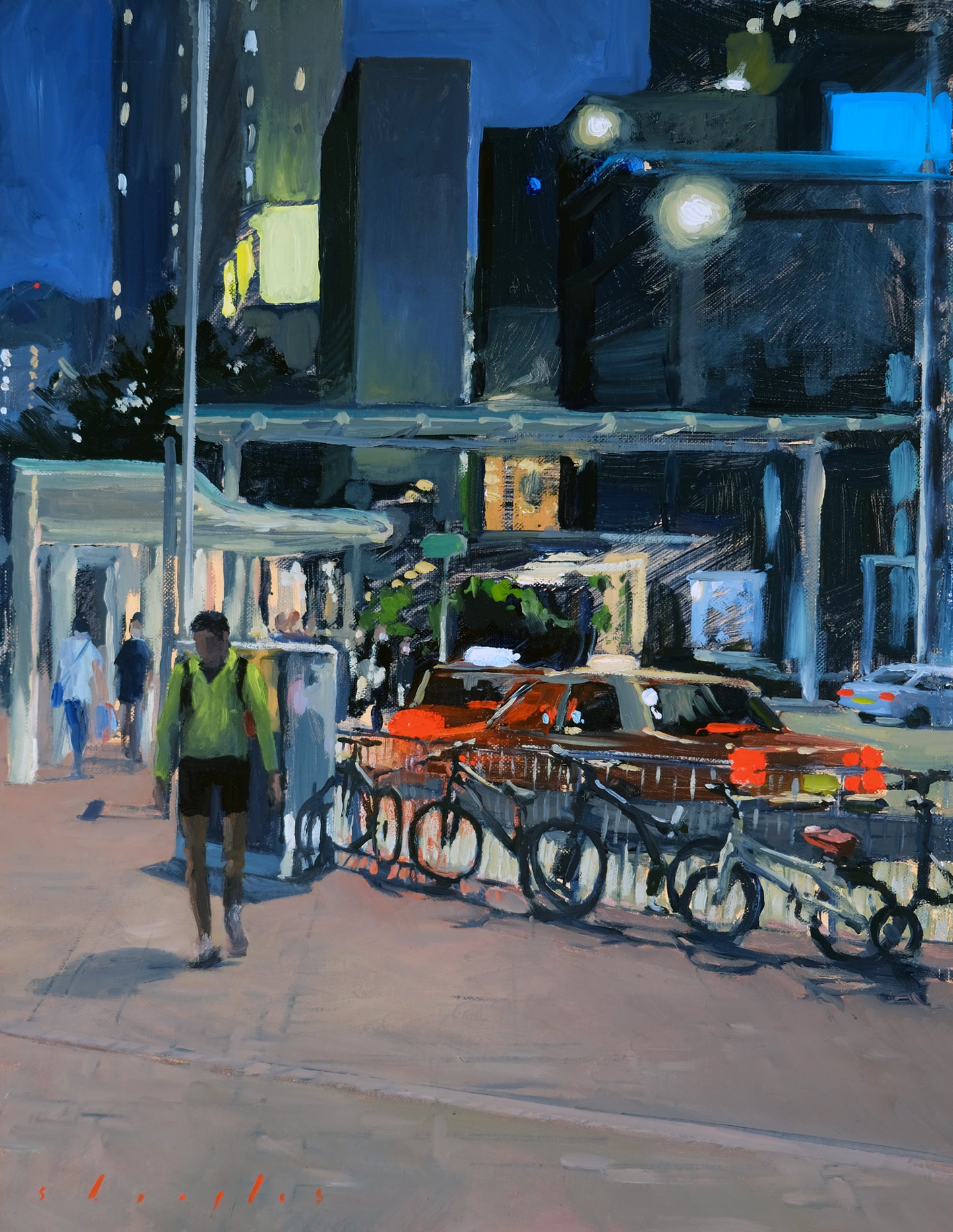 City street scene with people, cars, and a truck at night.