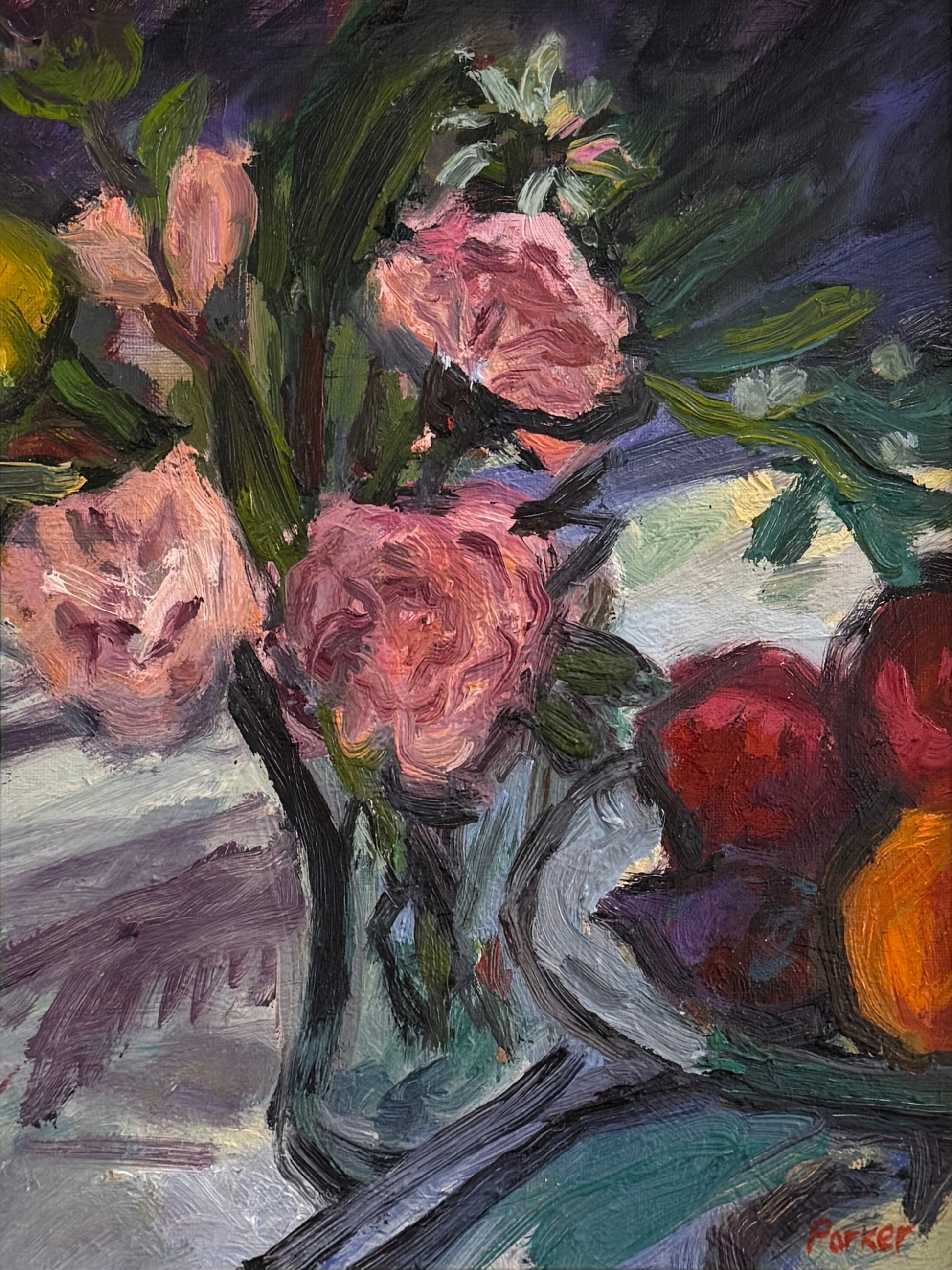 A framed still life painting featuring pink flowers in a vase with green leaves and red and orange fruit, set within a textured light brown wooden frame.