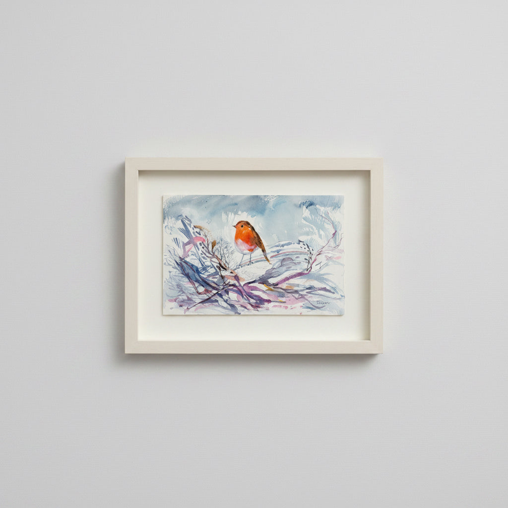 Framed artwork of a bird on a branch against a light gray background