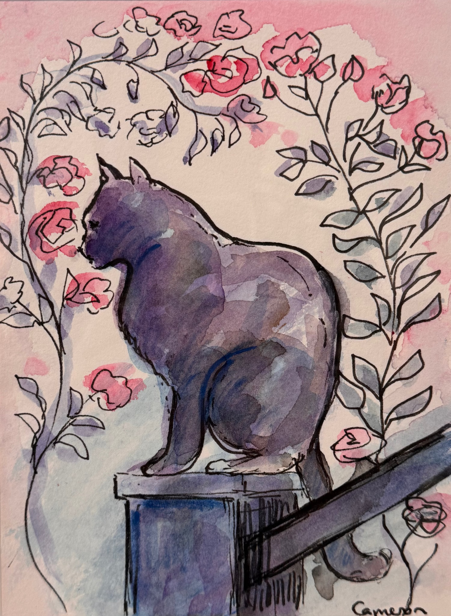 A watercolor and ink illustration of a dark purple-gray cat sitting on a wooden ledge, surrounded by pink flowers and green leaves on a light background, presented with a white mat board.