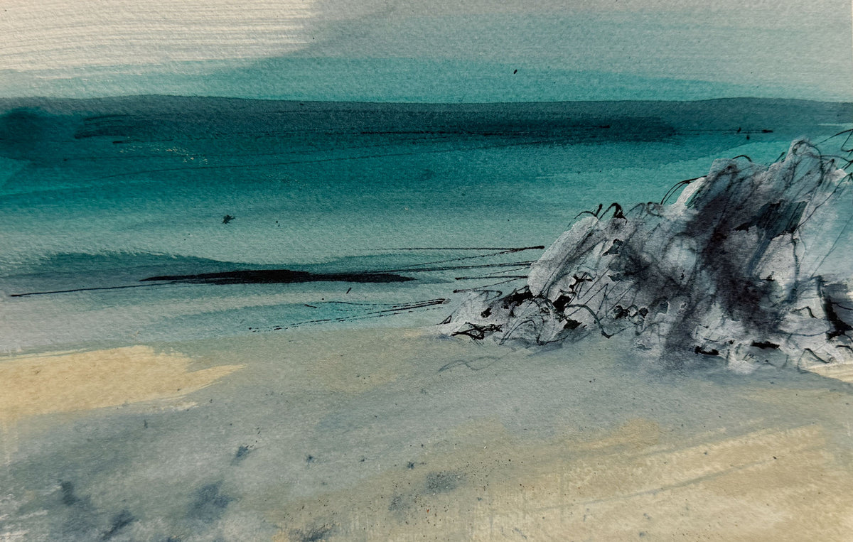 Watercolor landscape painting of a coastal scene with teal-blue water, pale sandy shore, and dark rocky formations on the right.