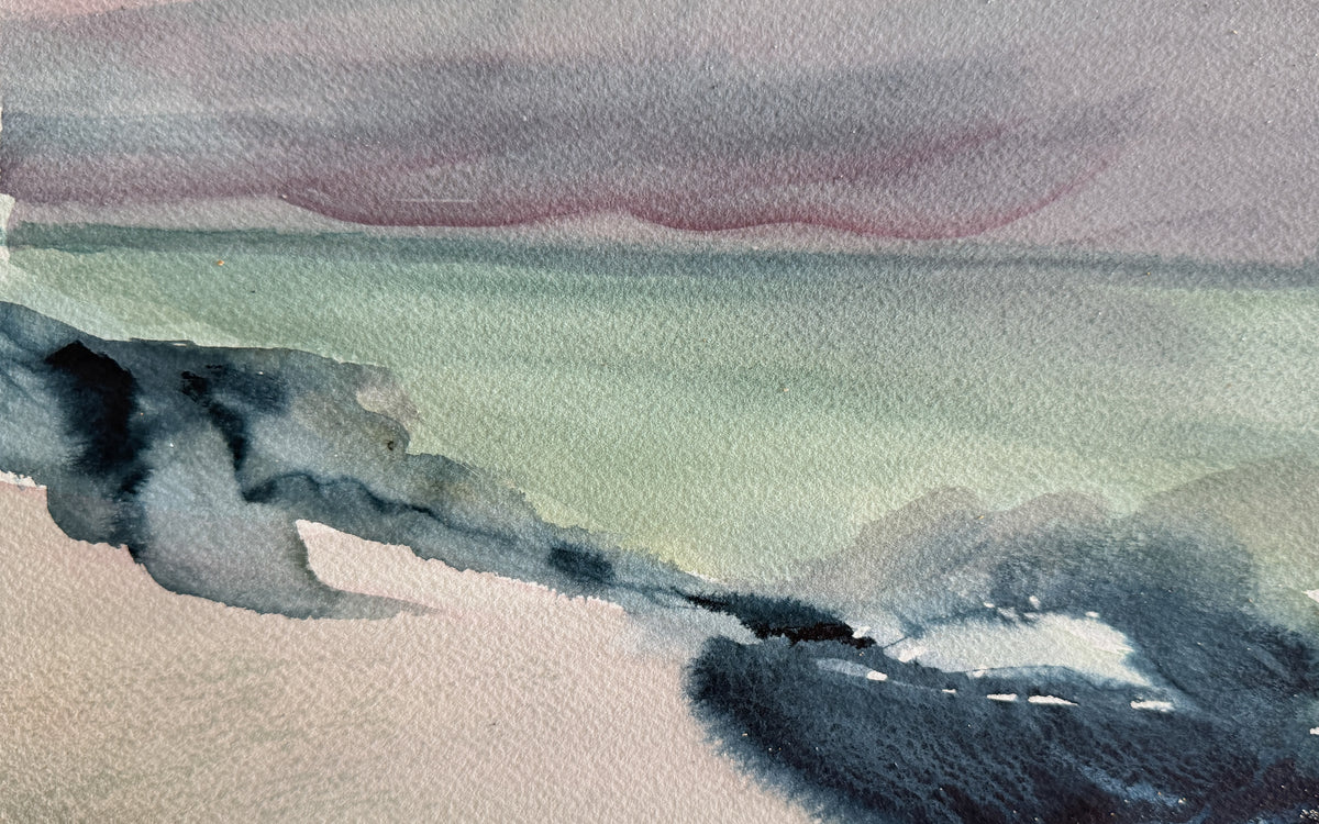 Watercolor landscape painting of a coastal scene with a pale green sea, dark blue-gray shoreline, and a muted mauve-gray sky.