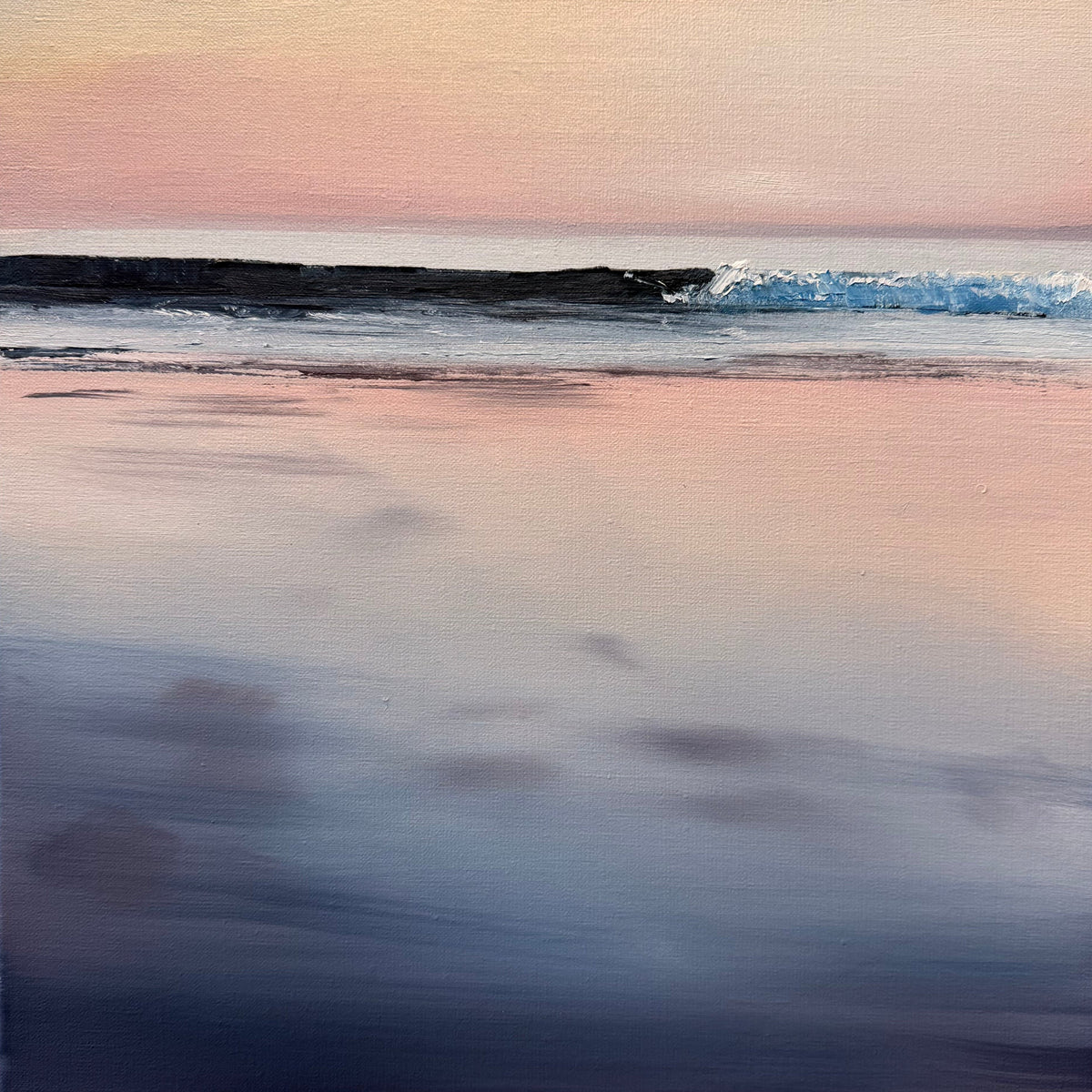 A framed square canvas painting of a calm beach or ocean scene at dusk, with soft pink and peach sky, a dark shoreline, blue-gray water, and a white frame.