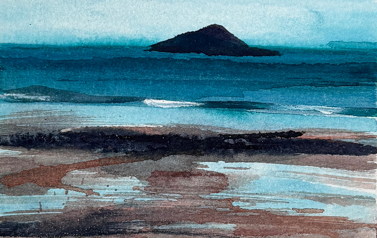 Watercolor landscape painting of a coastal scene with a small dark island rising from blue water, pale sky, and reflective shallow pools in the foreground.
