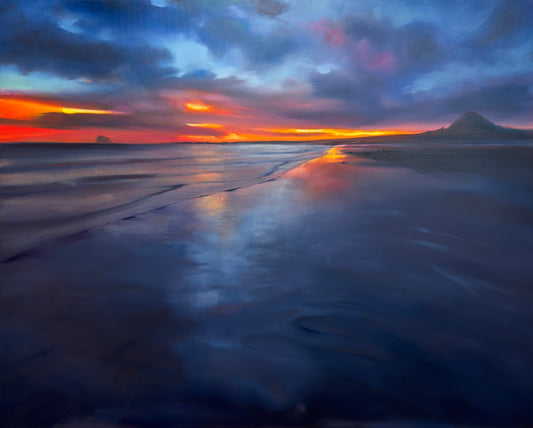 An impressionistic painting of a coastal sunset with dark blue and purple clouds, bright orange and red light on the horizon, and reflective water in the foreground.