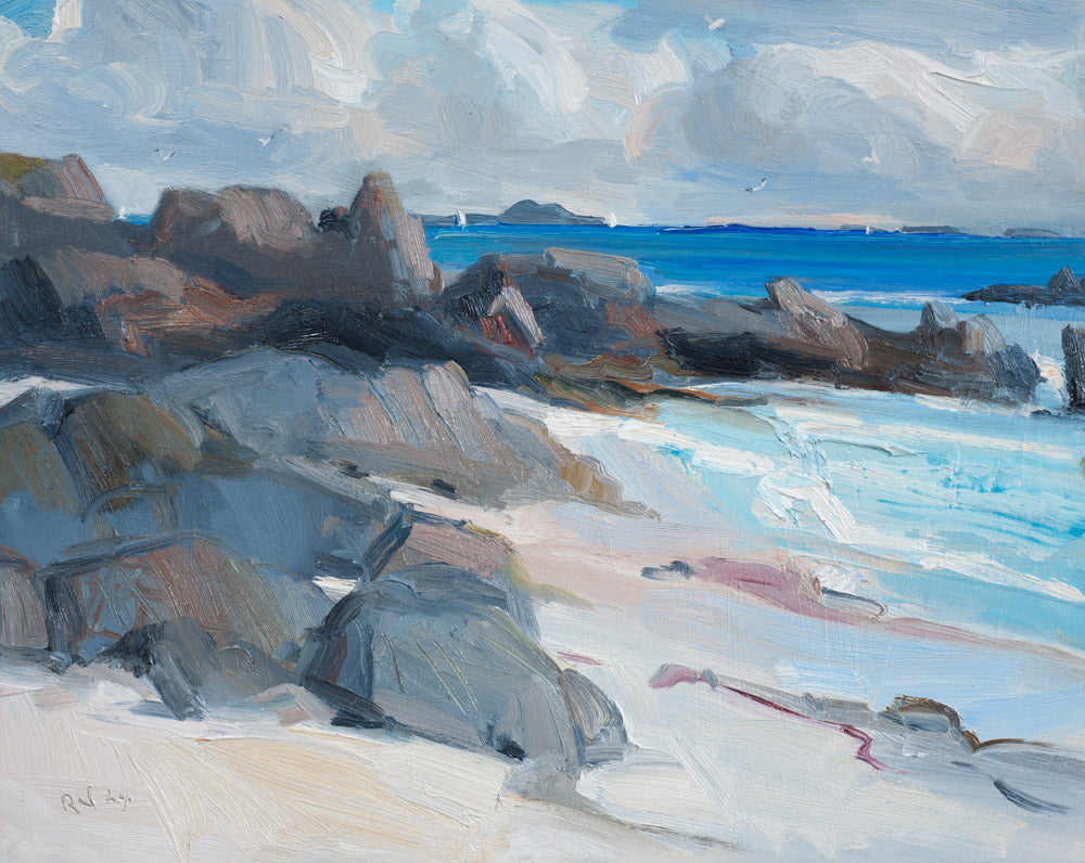 An impressionistic oil painting of a rocky coastal shoreline with blue ocean water, white surf, pale sand, and a cloudy sky. The brushwork is expressive rather than photorealistic, and no frame or wall surround is visible.
