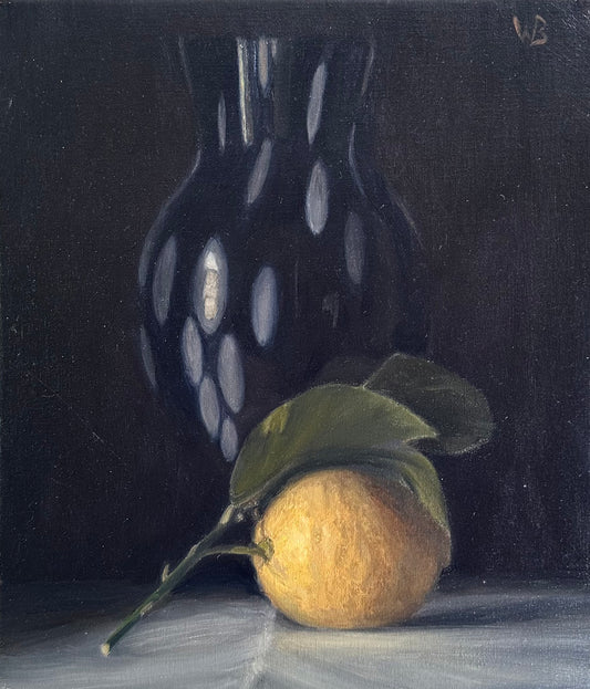 An oil painting of a still life showing a Sorrento lemon in front of a black vase and a black background. Painted by David Williams Bulkeley and measuring 35x45cm framed.