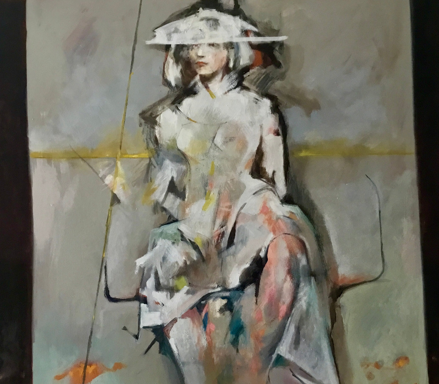 Artistic depiction of a person in a stylized manner with abstract colors and shapes.