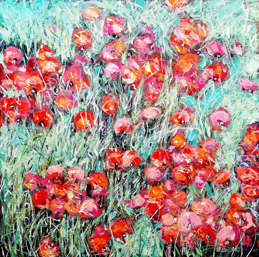 Artistic depiction of red and pink flowers with green grass on a blue background