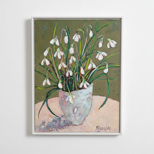 Framed artwork of a snowdrops design on a textured surface