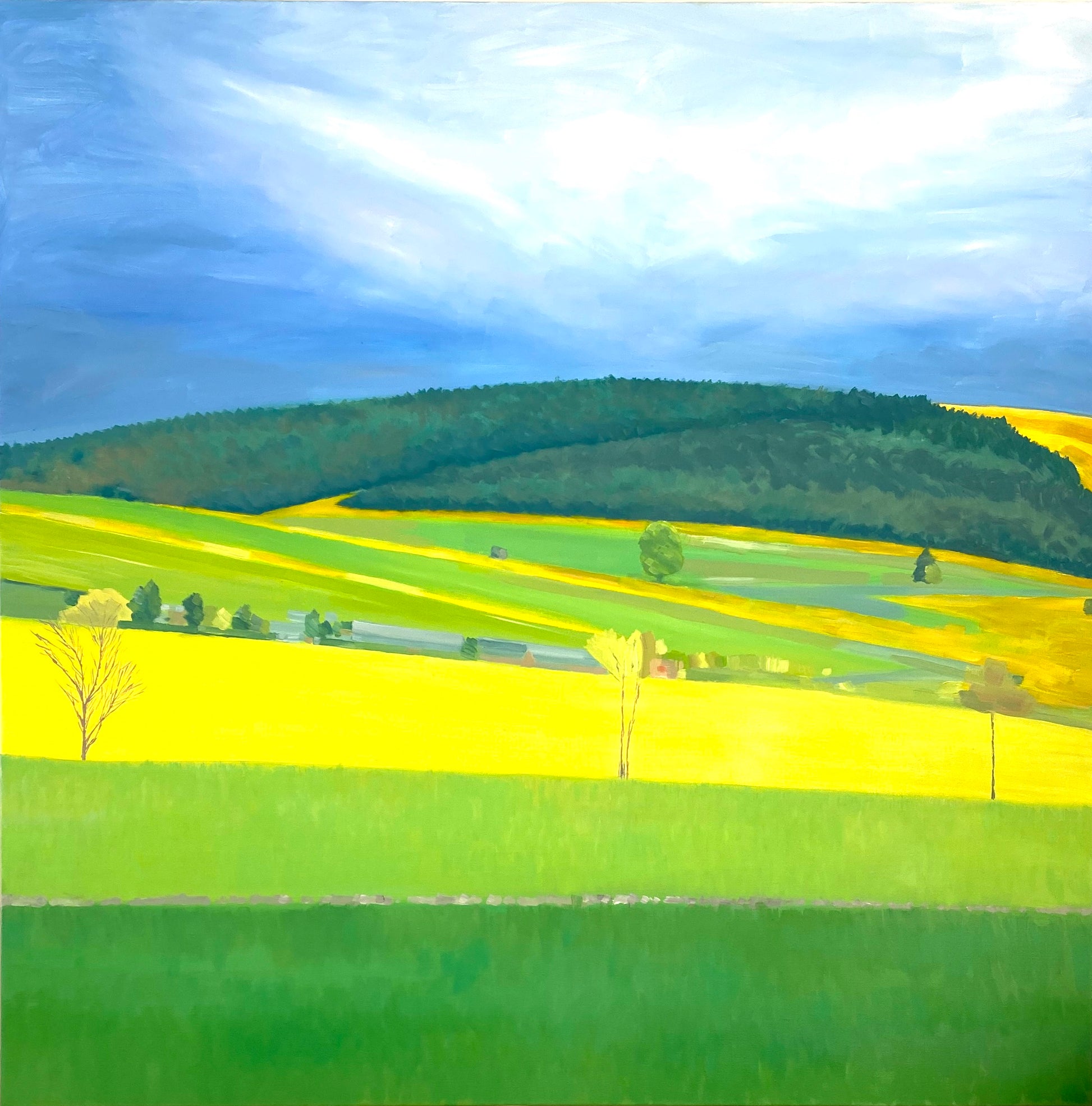 Landscape painting of a green field with a hill and blue sky.