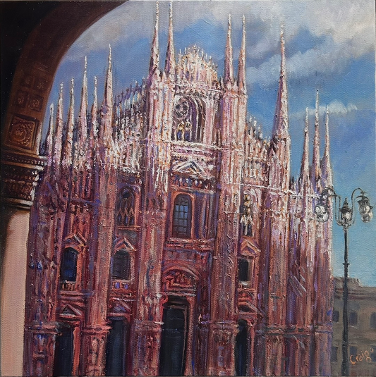 Gothic cathedral with intricate architecture against a blue sky