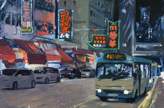 City street scene with a bus, cars, and neon signs at night.