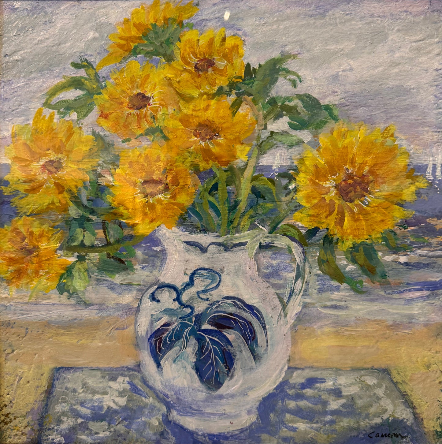 A framed painting depicting a white ceramic pitcher vase filled with bright yellow sunflowers, set against a soft blue and gray background.