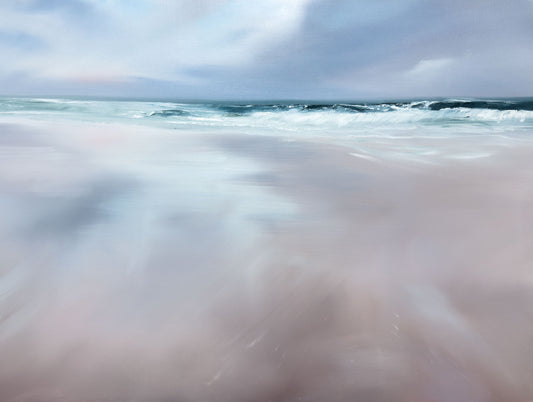 Wavy water surface with a blurred foreground and clear sky.