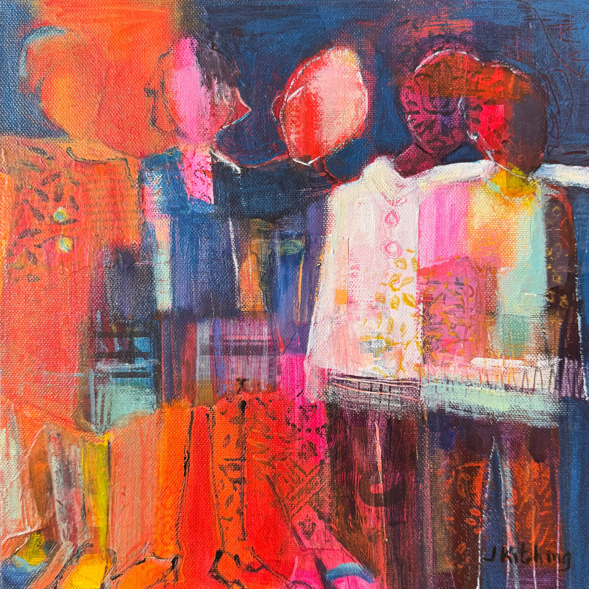 An abstract canvas painting depicting three stylized figures in a vibrant mix of red, orange, pink, blue, and white brushstrokes, displayed on a dark green textured surface.