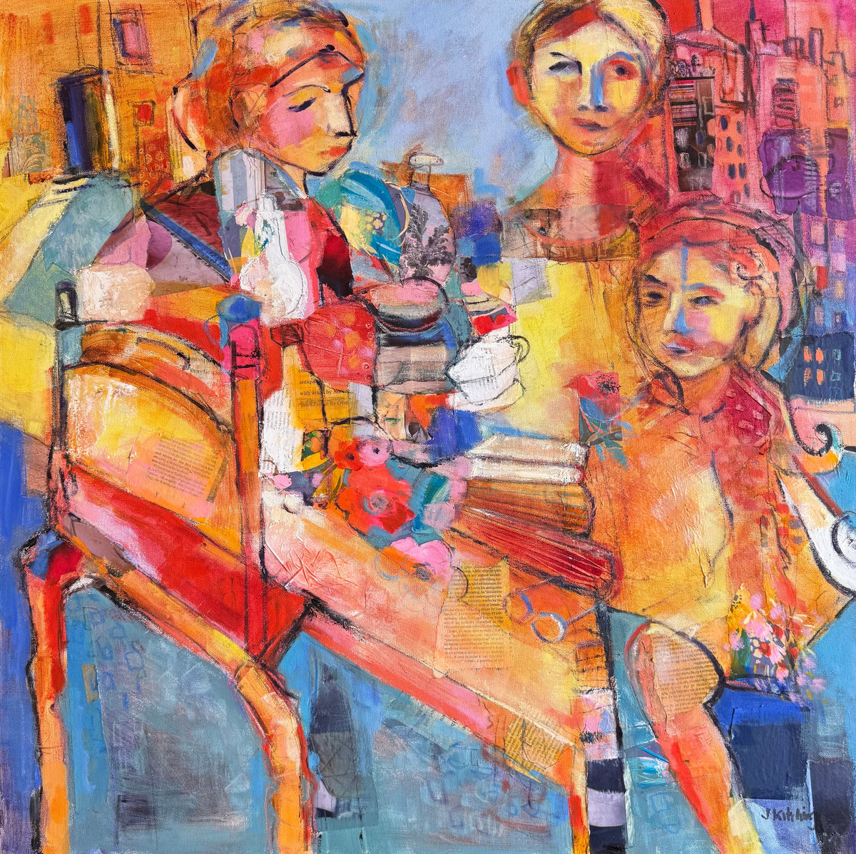 An abstract expressionist painting depicting three stylized figures around a table with colorful objects, rendered in expressive brushstrokes of orange, yellow, blue, red, and purple on a dark textured background.