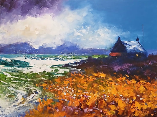 Framed painting of a landscape with a castle and colourful fields.
