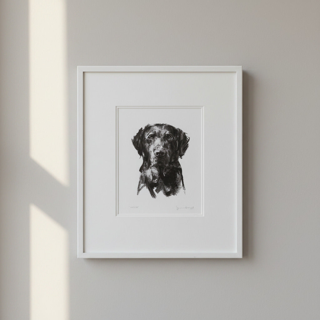 Framed black and white artwork of a bird on a textured surface
