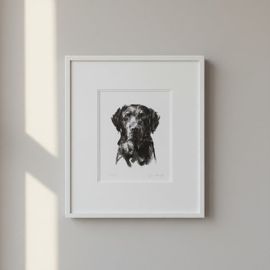 Framed black and white artwork of a bird on a textured surface