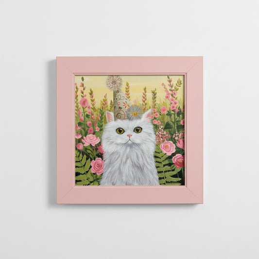 painting of a white cat wearing a party hat, against a floral background. The frame is modern and painted pink