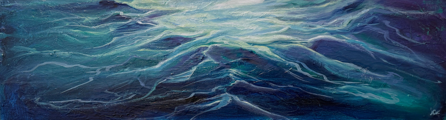 Framed abstract artwork with wavy blue patterns on a textured wall.