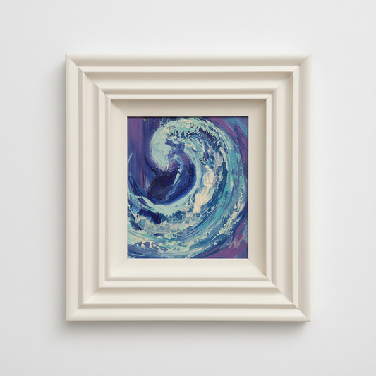 framed abstract painting of a wave