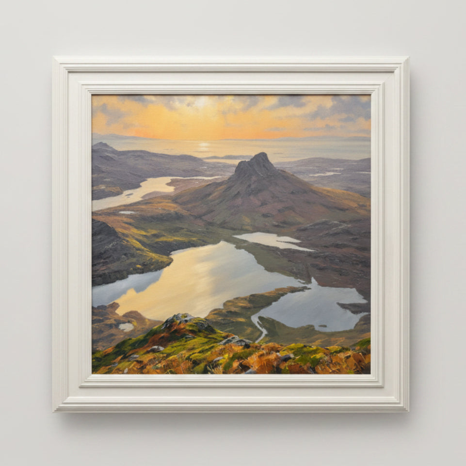 Framed painting of a mountain landscape with a lake and sunset.