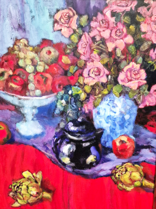 Still life painting with flowers, a teapot, and fruits on a red surface.