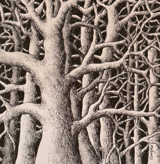 Framed artwork of tree branches on a dark background