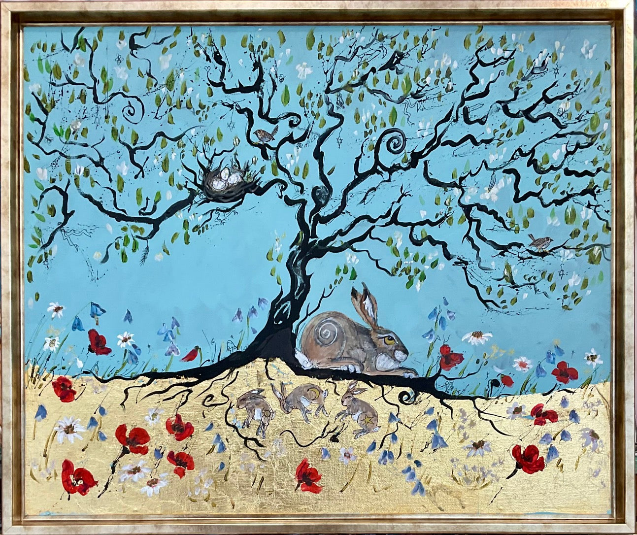 Artistic depiction of a tree with bunnies and flowers against a blue sky.