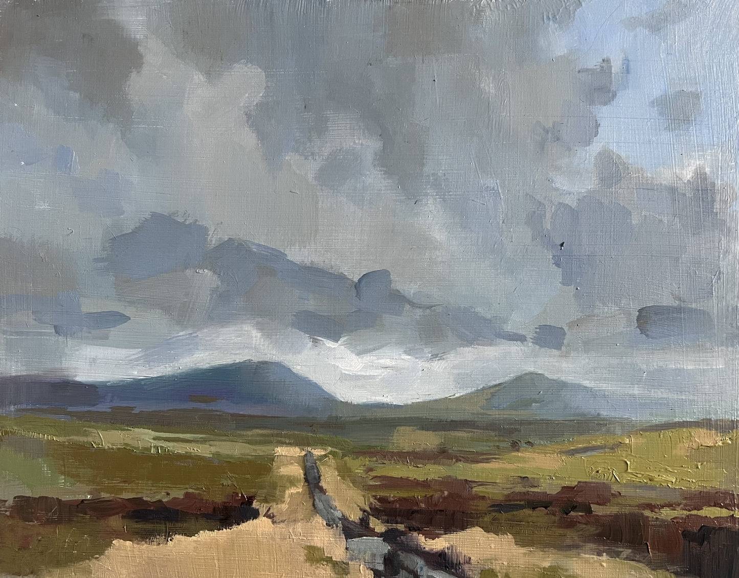 Painting of a landscape with a road, fields, and mountains under a cloudy sky.