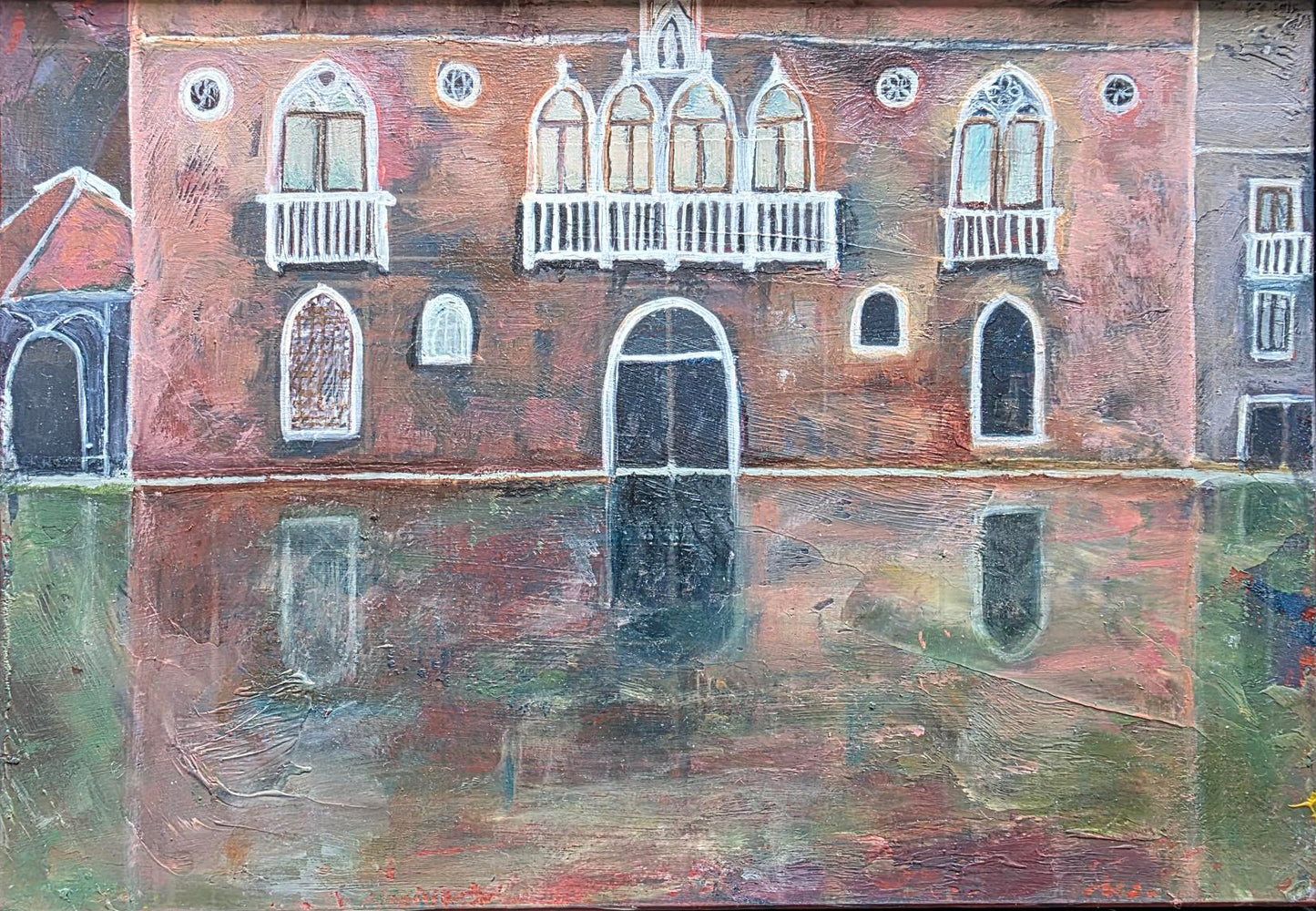 Framed painting of a canal scene with buildings