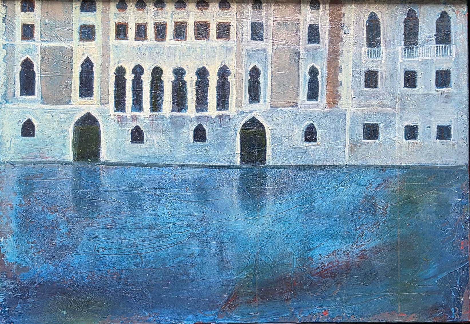 Framed artwork of a building reflected in water